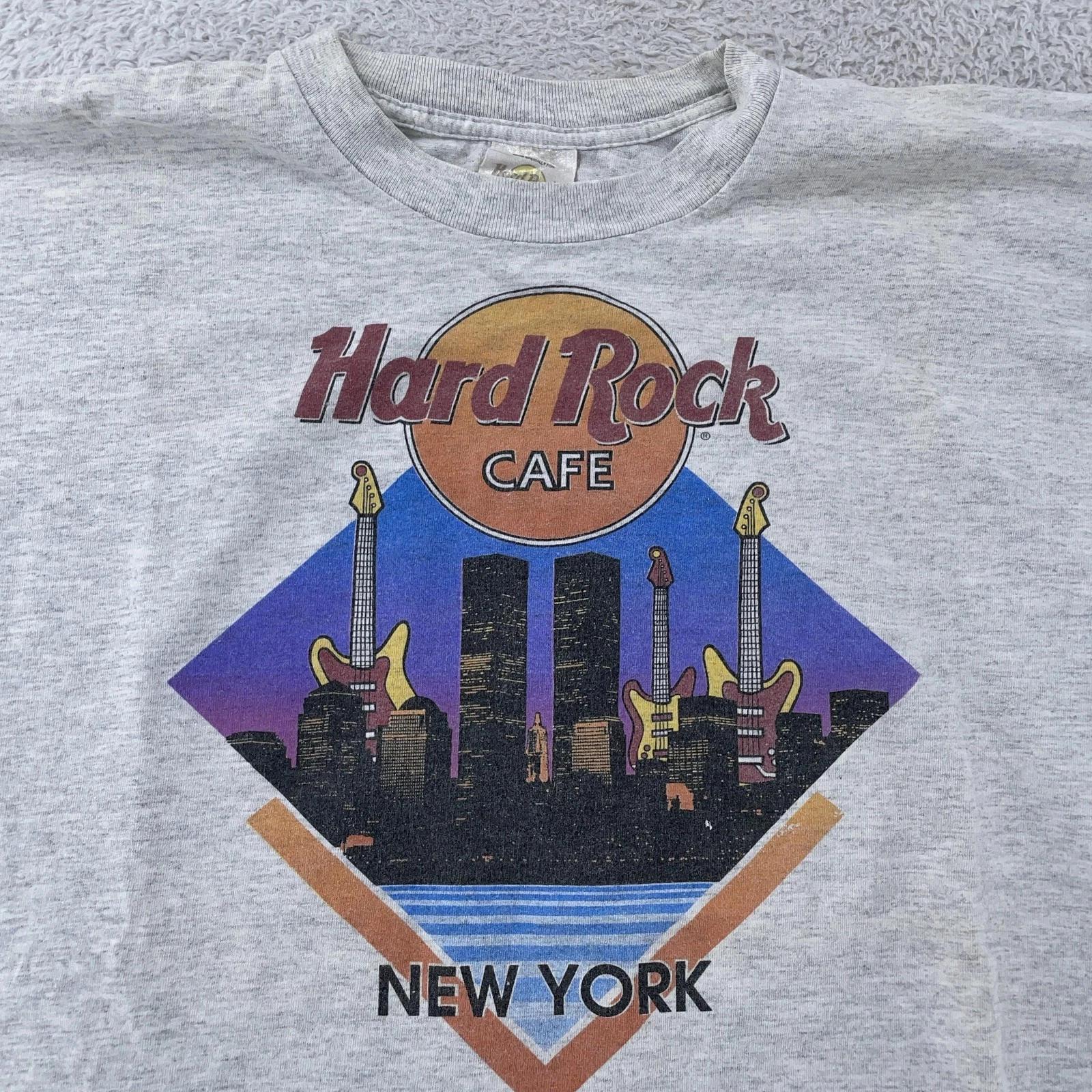Винтажная футболка Hard Rock Cafe Мужская Размер L Нью-Йорк Силуэт Города Одиночный шов 90-е 2XL
Винтажная футболка Hard Rock Cafe Мужская Размер L Нью-Йорк Силуэт Города Одиночный шов 90-е 2XL