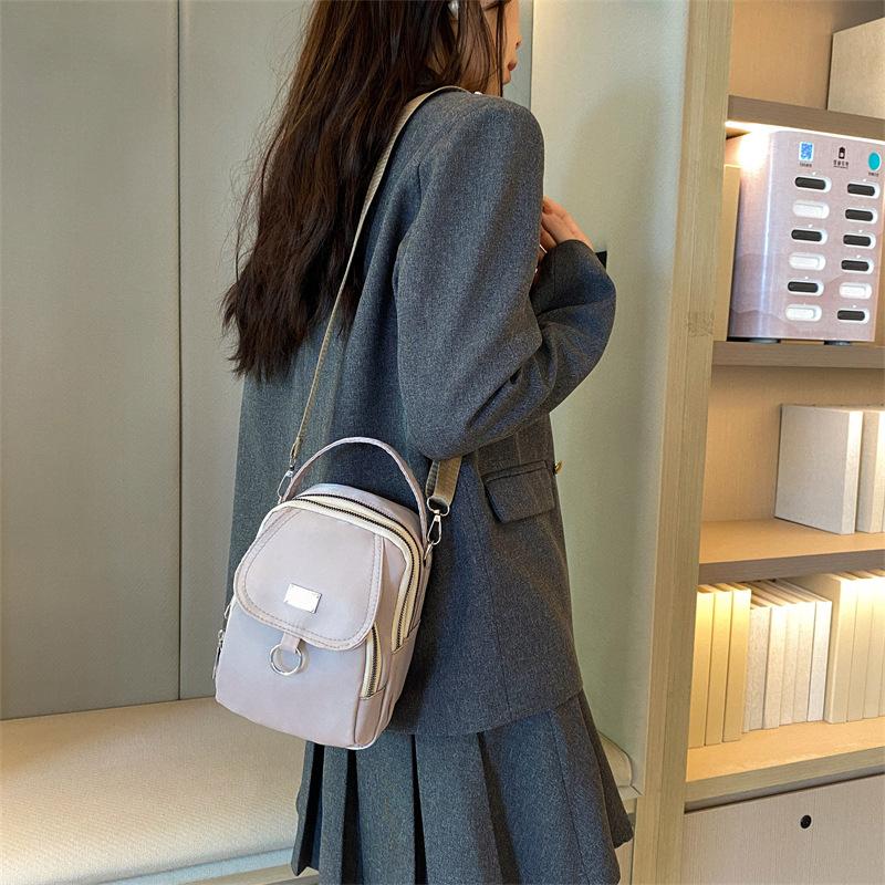 Oxford cloth small bag new fashion mini mobile phone bag casual versatile shoulder messenger bag light handbag темно-рожевого кольору
Oxford cloth small bag new fashion mini mobile phone bag casual versatile shoulder messenger bag light handbag темно-рожевого кольору