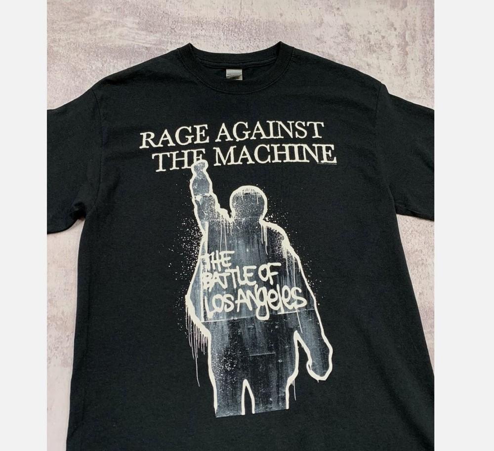 Rage Against the Machine The Battle Black Unisex T-shirt Size S-5XL Unisex T-Shirt XXL
Rage Against the Machine The Battle Black Unisex T-shirt Size S-5XL Unisex T-Shirt XXL
