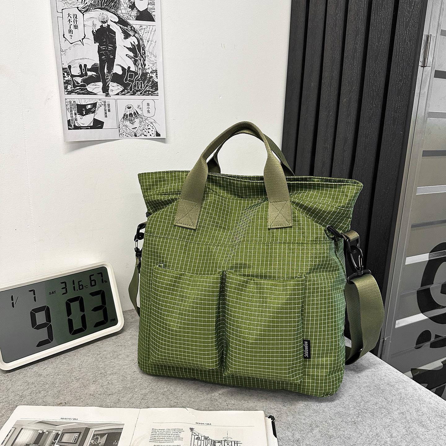 Plaid tote bag, men s and women s large-capacity portable shoulder commuter bag, large-capacity flat bag, locomotive mailman messenger bag.
Plaid tote bag, men s and women s large-capacity portable shoulder commuter bag, large-capacity flat bag, locomotive mailman messenger bag.