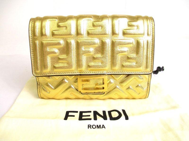 Автентичний гаманець FENDI Zucca Gold Leather Bifold Wallet Conpact Wallet #9708 Refurbished
Автентичний гаманець FENDI Zucca Gold Leather Bifold Wallet Conpact Wallet #9708 Refurbished