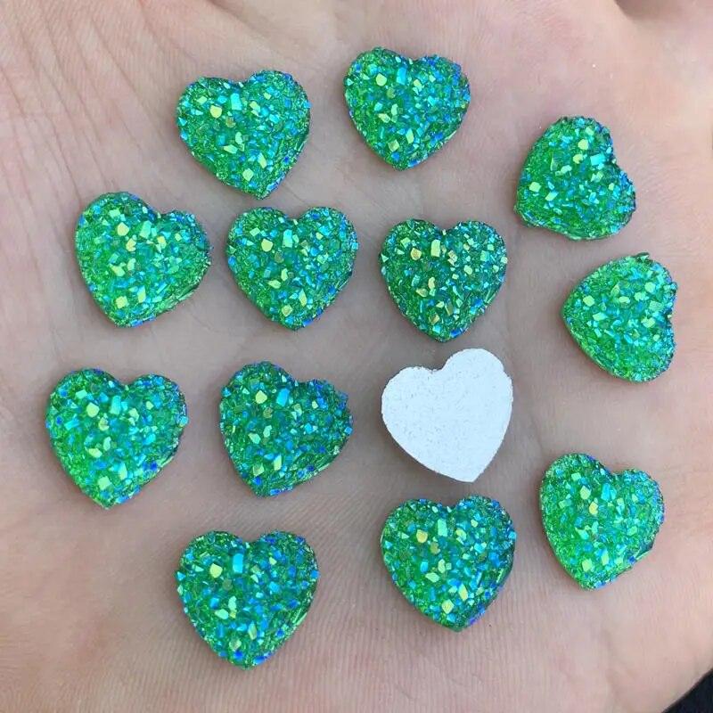 40 ШТ. 12 мм блискітки AB Кольори Мінеральна поверхня Серце Смола Rhinestone Flatback Cabochon Stone DIY Весільні прикраси Ремесла
40 ШТ. 12 мм блискітки AB Кольори Мінеральна поверхня Серце Смола Rhinestone Flatback Cabochon Stone DIY Весільні прикраси Ремесла