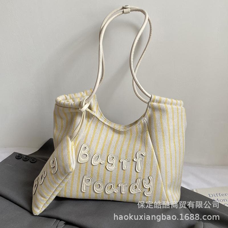 Large capacity canvas bag women s summer 2025 new simple and versatile shoulder bag casual college student class tote bag синий
Large capacity canvas bag women s summer 2025 new simple and versatile shoulder bag casual college student class tote bag синий