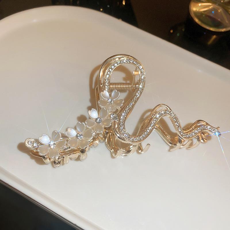 Заколка для волос с жемчужными цветками и бриллиантами, модный и роскошный аксессуар для волос
Заколка для волос с жемчужными цветками и бриллиантами, модный и роскошный аксессуар для волос