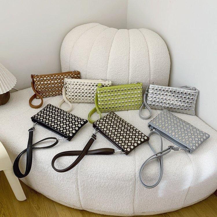 Women s one-shoulder messenger bag, casual messenger bag, polka dot rivet, underarm bag, high-end fashion PU envelope bag. One size коричневий
Women s one-shoulder messenger bag, casual messenger bag, polka dot rivet, underarm bag, high-end fashion PU envelope bag. One size коричневий