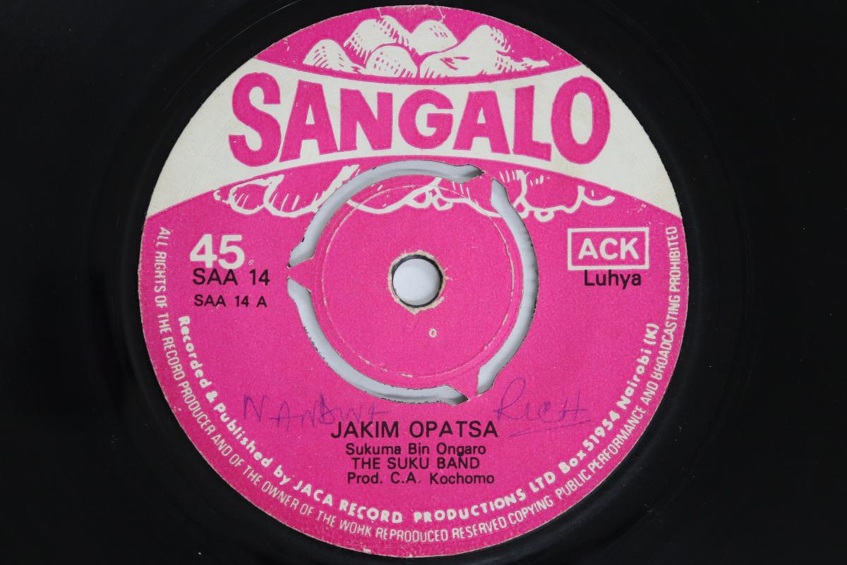 7-дюймовая пластинка SUKUMA BIN ONGARO, SUKU BAND - Jakim Opatsa / Tekila Owino SAA14 SANGALO Кения Мировая музыка Б/У
7-дюймовая пластинка SUKUMA BIN ONGARO, SUKU BAND - Jakim Opatsa / Tekila Owino SAA14 SANGALO Кения Мировая музыка Б/У