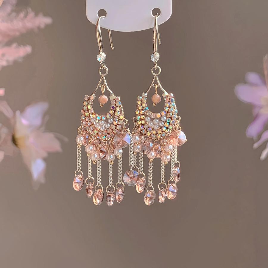 Zircon pearl colored crystal fringed earrings fashionable retro temperament earrings niche versatile high-end earrings women
Zircon pearl colored crystal fringed earrings fashionable retro temperament earrings niche versatile high-end earrings women
