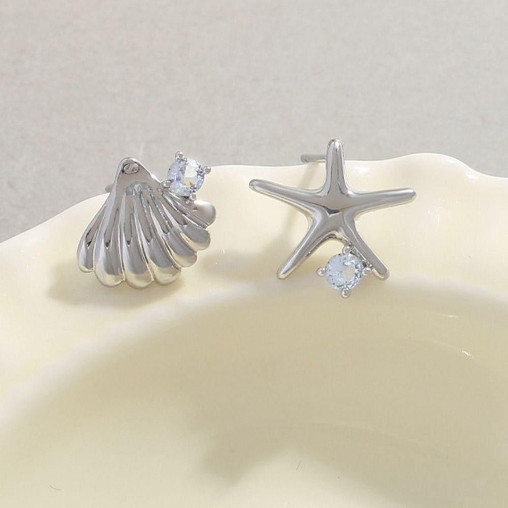 Нежные асимметричные серьги-гвоздики с синим цирконием, серьги-гвоздики для женщин, серьги-звезды в виде ракушки для девочек
Нежные асимметричные серьги-гвоздики с синим цирконием, серьги-гвоздики для женщин, серьги-звезды в виде ракушки для девочек
