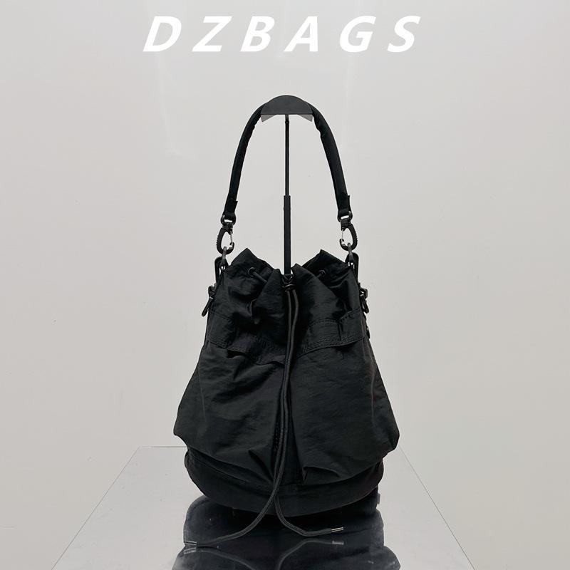 Khaki Drawstring Bag Diagonal Cross Bag Summer New Couple Style Nylon Bucket Bag Casual Bag Handbag Commuting Bag
Khaki Drawstring Bag Diagonal Cross Bag Summer New Couple Style Nylon Bucket Bag Casual Bag Handbag Commuting Bag