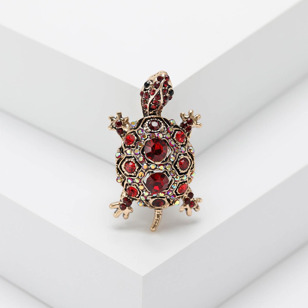 Модная винтажная брошь в виде черепахи со стразами, креативная индивидуальная булавка в виде животного, аксессуары для одежды
Модная винтажная брошь в виде черепахи со стразами, креативная индивидуальная булавка в виде животного, аксессуары для одежды