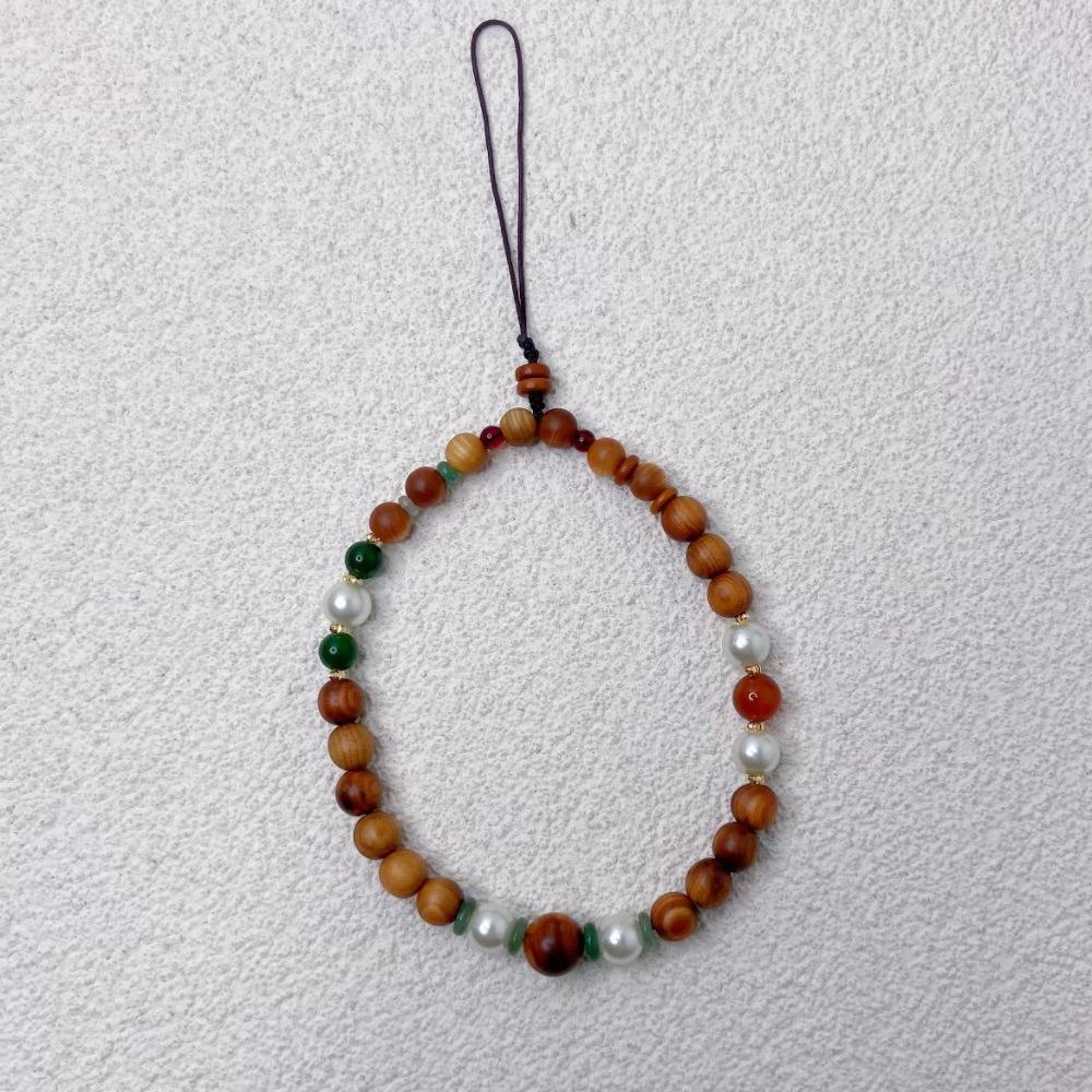 Natural cypress wood Bodhi clip pearl Chinese style advanced sense anti-lost hand carry pendant mobile phone chain
Natural cypress wood Bodhi clip pearl Chinese style advanced sense anti-lost hand carry pendant mobile phone chain