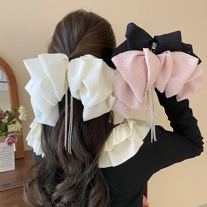 Bow tassel hairpin women s fashion light luxury spring clip versatile headgear hair accessories high sense
Bow tassel hairpin women s fashion light luxury spring clip versatile headgear hair accessories high sense