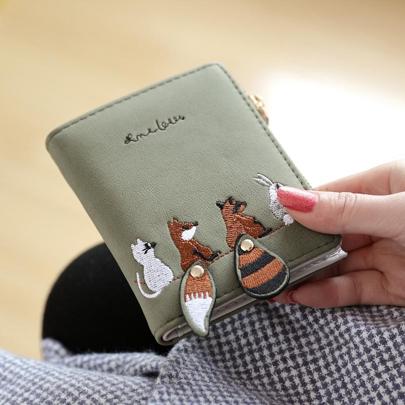 Small wallet short female new embroidered zipper student multi-card cute change bag темно-зелений колір
Small wallet short female new embroidered zipper student multi-card cute change bag темно-зелений колір