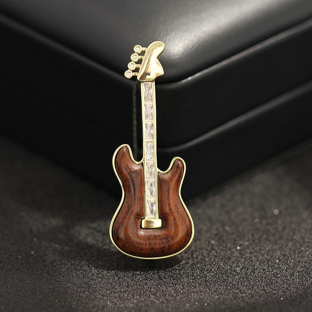 New niche exquisite diamond-encrusted wood piano brooch personalized versatile diamond-encrusted musical instrument pin anti-light corsage female
New niche exquisite diamond-encrusted wood piano brooch personalized versatile diamond-encrusted musical instrument pin anti-light corsage female