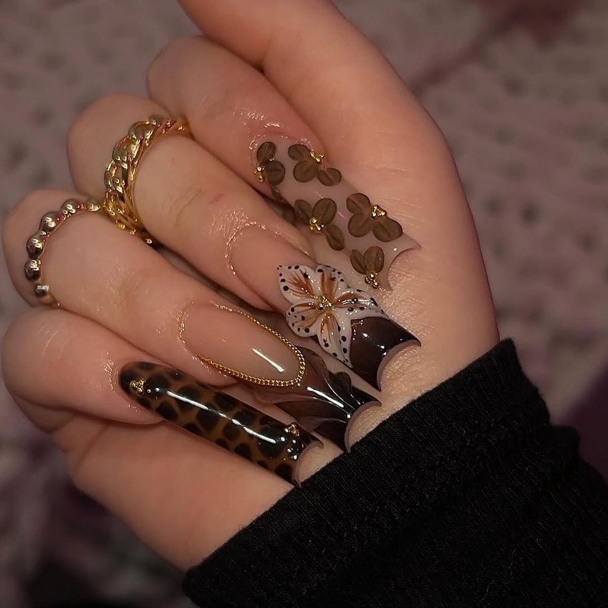 Stylish Long Press-on Nails with 3D Floral & Leopard Print, Rhinestones, Chains.
Stylish Long Press-on Nails with 3D Floral & Leopard Print, Rhinestones, Chains.