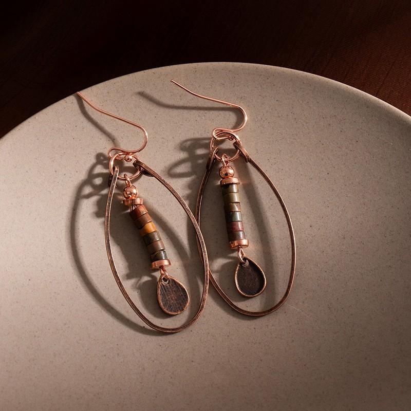 Bohemian Earrings Retro Natural Stone Beaded Pendant Earrings Premium Sense Maillard Earrings
Bohemian Earrings Retro Natural Stone Beaded Pendant Earrings Premium Sense Maillard Earrings