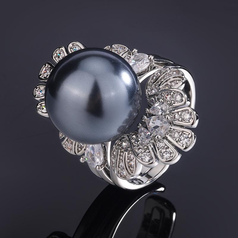 Ювелирные изделия Медь Платиновое покрытие Инкрустированный австрийским перламутром Инкрустированное кольцо 2-в-1 с открытием и регулируемым размером 14 мм
Ювелирные изделия Медь Платиновое покрытие Инкрустированный австрийским перламутром Инкрустированное кольцо 2-в-1 с открытием и регулируемым размером 14 мм