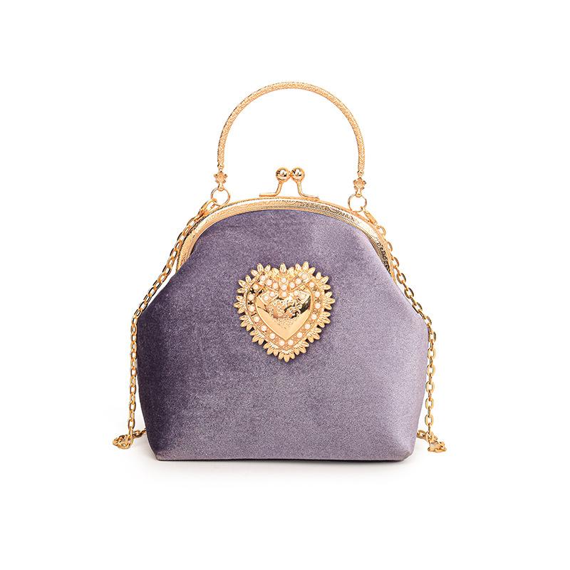 Simple retro style exquisite heart-shaped hardware contrasting color women s small square bag winter new mature shoulder messenger bag фіолетовий
Simple retro style exquisite heart-shaped hardware contrasting color women s small square bag winter new mature shoulder messenger bag фіолетовий