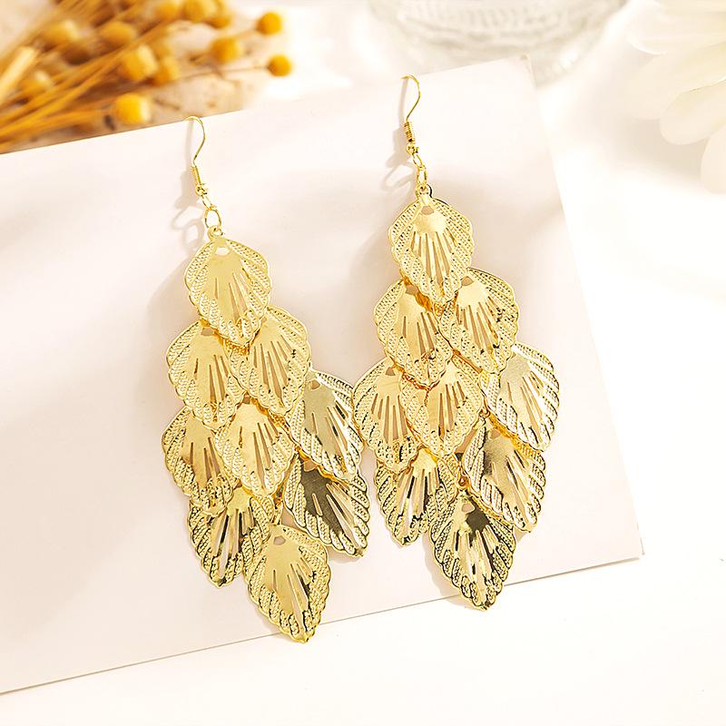 Геометрические серьги-кисточки в стиле ретро с многослойными полыми металлическими листьями
Геометрические серьги-кисточки в стиле ретро с многослойными полыми металлическими листьями