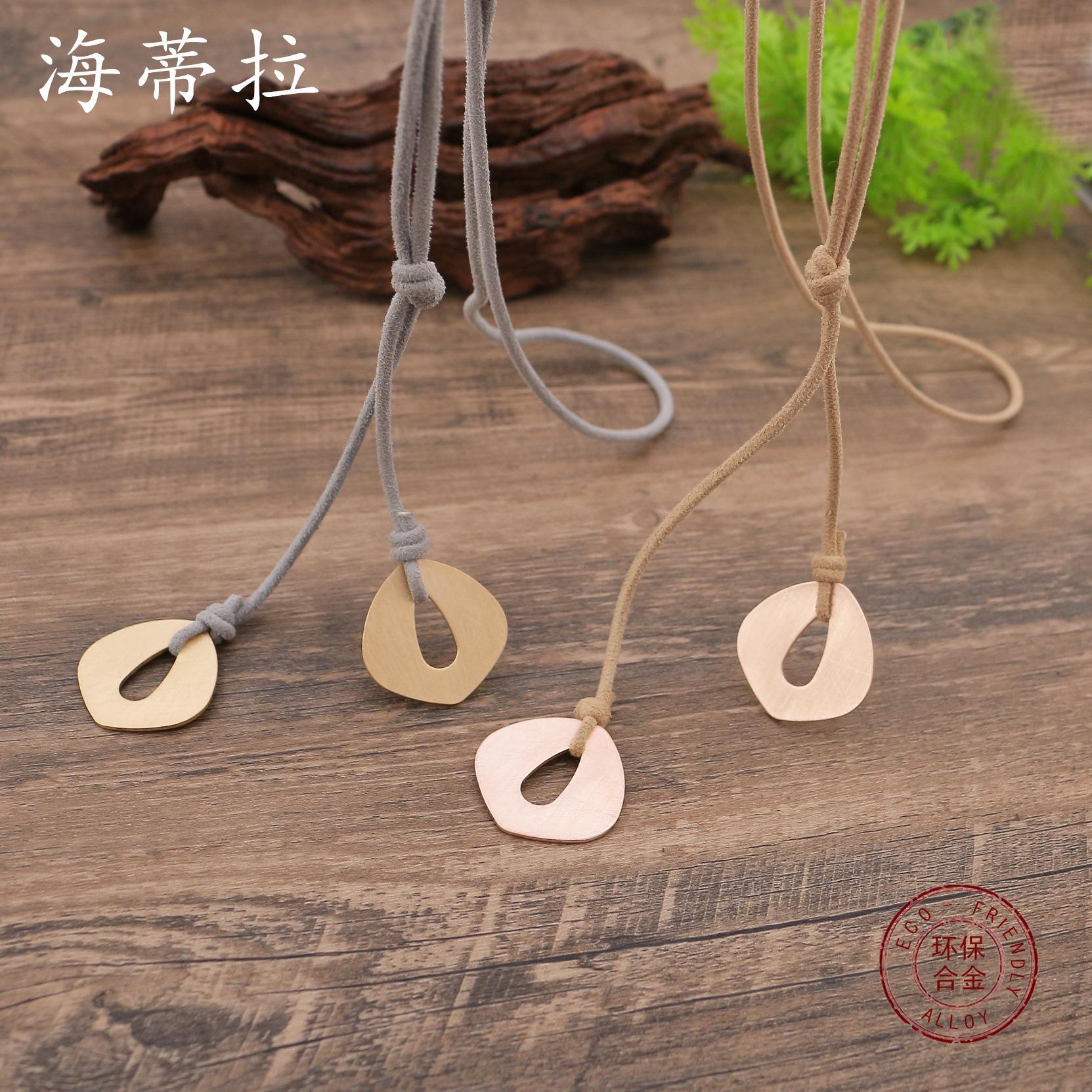 New geometric brushed handmade leather rope tie line long pendant, women s simple geometric small pendant
New geometric brushed handmade leather rope tie line long pendant, women s simple geometric small pendant