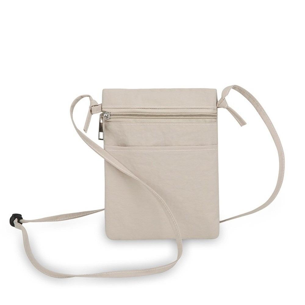 Minimalist Portable Cell Phone Bag Solid Color Nylon Fabric Shoulder Bag Thin Strap Lightweight Crossbody Bag for Men and Women хаки
Minimalist Portable Cell Phone Bag Solid Color Nylon Fabric Shoulder Bag Thin Strap Lightweight Crossbody Bag for Men and Women хаки