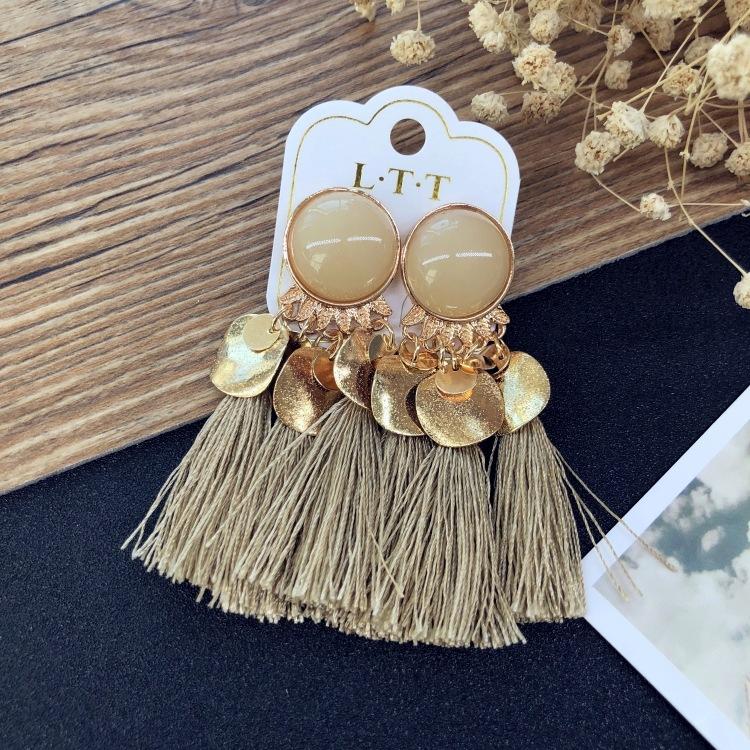 Ретро персонализированные серьги-кисточки с пайетками и шипами Богемные женские универсальные темпераментные длинные серьги Серьги в этническом стиле
Ретро персонализированные серьги-кисточки с пайетками и шипами Богемные женские универсальные темпераментные длинные серьги Серьги в этническом стиле