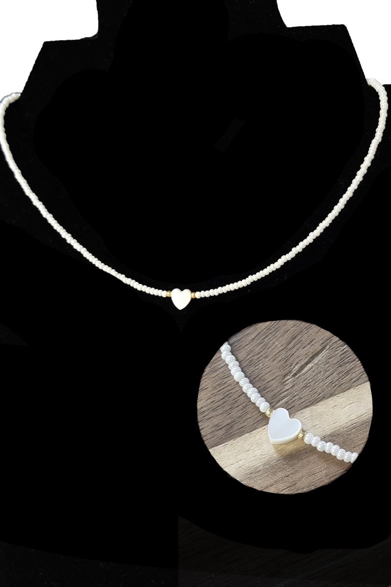 Білий бісерний чокер з підвіскою у формі серця з натуральної прісноводної раковини one size білий
Білий бісерний чокер з підвіскою у формі серця з натуральної прісноводної раковини one size білий