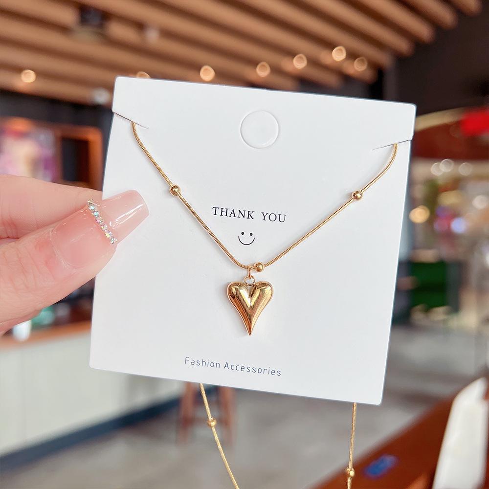 18K Gold Plated Titanium Steel Heart Pendant Necklace - Non-fading, Stylish Sweater Chain for Women
18K Gold Plated Titanium Steel Heart Pendant Necklace - Non-fading, Stylish Sweater Chain for Women