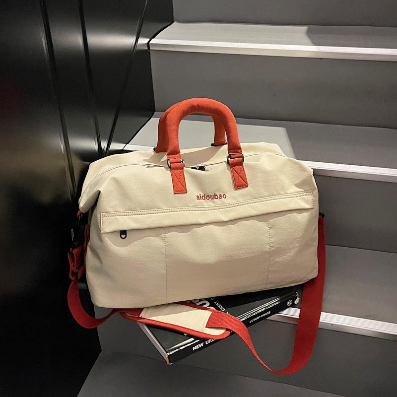 Short-haul travel bag Large capacity hand-held travel luggage Storage bag Women s sports fitness bag Leisure and lightweight messenger bag
Short-haul travel bag Large capacity hand-held travel luggage Storage bag Women s sports fitness bag Leisure and lightweight messenger bag