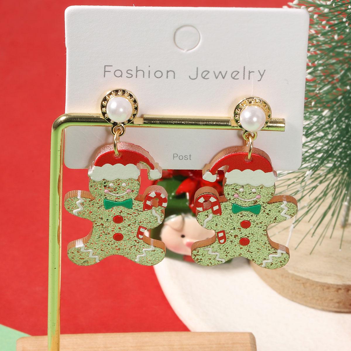 Cute European and American Christmas cartoon glitter print gingerbread man earrings, fashionable and creative Christmas hat bow earrings
Cute European and American Christmas cartoon glitter print gingerbread man earrings, fashionable and creative Christmas hat bow earrings