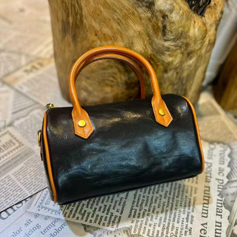 Женская сумка-бостон из натуральной кожи с цветными блоками 22x11x13 cm
Женская сумка-бостон из натуральной кожи с цветными блоками 22x11x13 cm