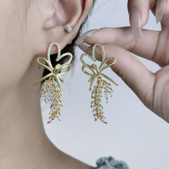 New light luxury love wheat ear fringed ear hanging fashion simple versatile temperament high sense love rice ear jewelry золотий
New light luxury love wheat ear fringed ear hanging fashion simple versatile temperament high sense love rice ear jewelry золотий