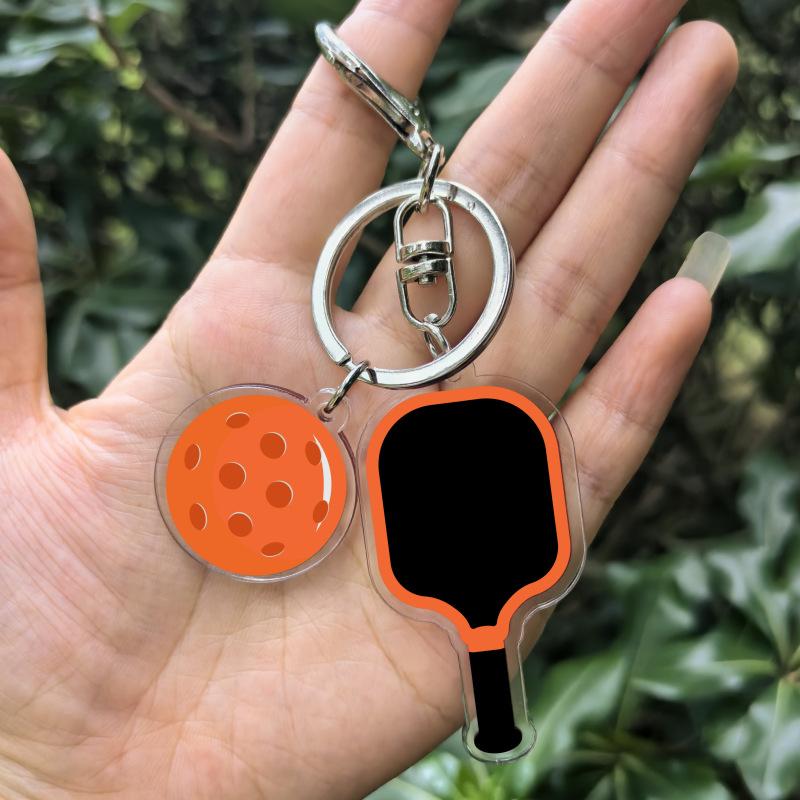 Креативная металлическая брелок-ракетка для пиклбола, красочные брелоки в виде полых мячей для гольфа, сувенир для фанатов динкбола, подвеска для подарочного пакета для вечеринки
Креативная металлическая брелок-ракетка для пиклбола, красочные брелоки в виде полых мячей для гольфа, сувенир для фанатов динкбола, подвеска для подарочного пакета для вечеринки