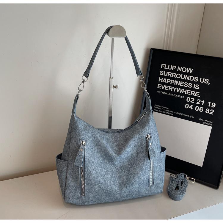 Трендовая женская сумка-тоут для通勤 2024 большой вместимости - Модная нишевая текстура, на плечо и через плечо
Трендовая женская сумка-тоут для通勤 2024 большой вместимости - Модная нишевая текстура, на плечо и через плечо