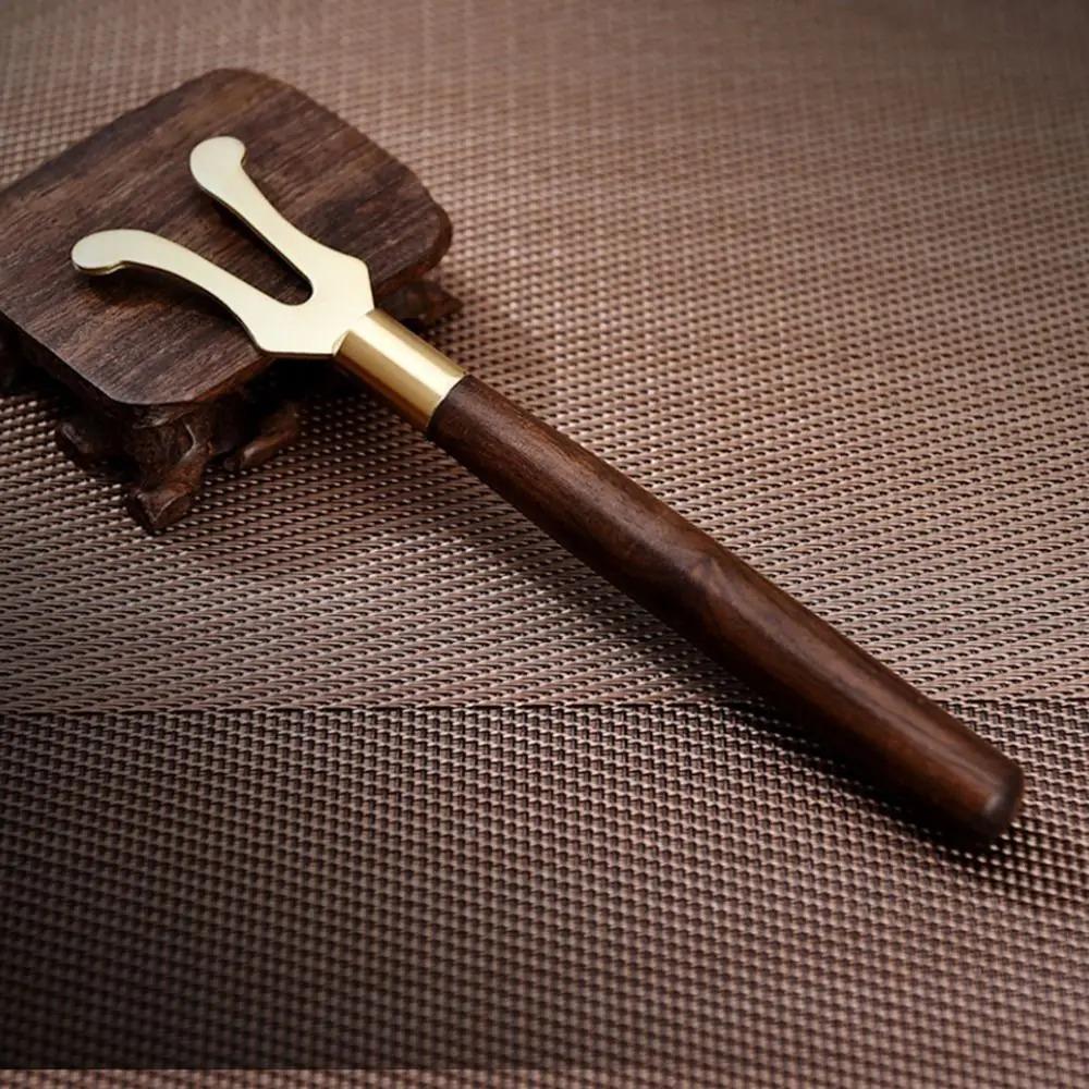 17cm Tea Kettle Cover Fork Wood Copper Kung Fu Tea Tools New Teapot Lid Clip for Cast Iron Teapot 1pc
17cm Tea Kettle Cover Fork Wood Copper Kung Fu Tea Tools New Teapot Lid Clip for Cast Iron Teapot 1pc