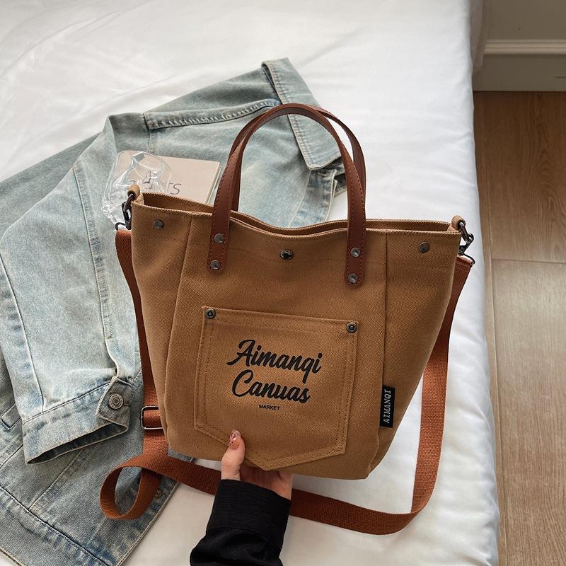 Fashi Canvas Shoulder Bag Women Winter Large Capacity Crossbody Bag for Work Commute Comfortable Versatile Texture Bucket Bag
Fashi Canvas Shoulder Bag Women Winter Large Capacity Crossbody Bag for Work Commute Comfortable Versatile Texture Bucket Bag