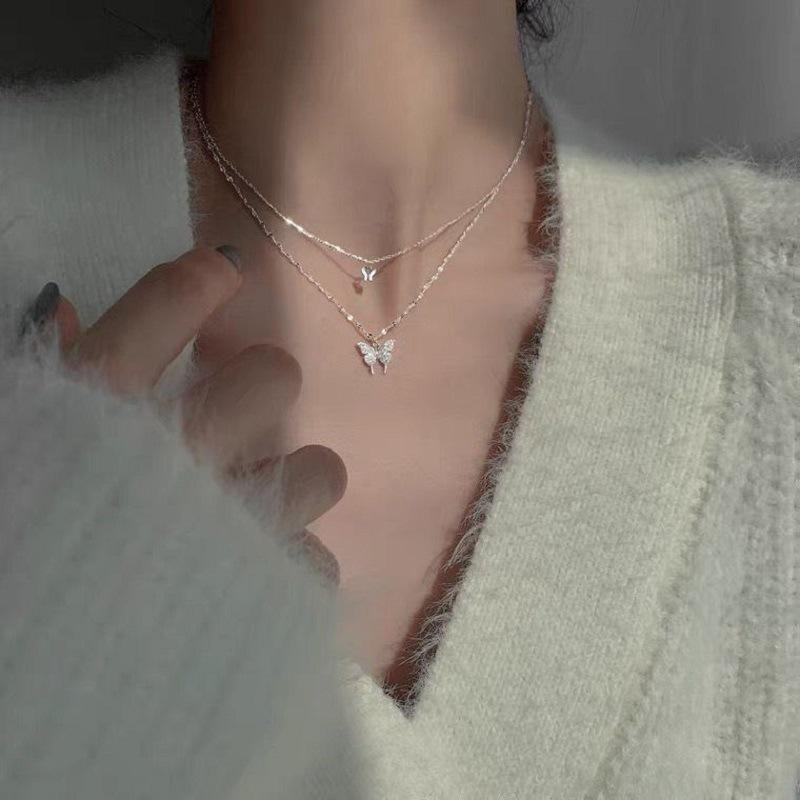 Japanese & Korean Double Layer Butterfly Necklace: Women s Sparkling Diamond Choker, Spring/Summer Trend, Versatile Cool Style Clavicle Chain
Japanese & Korean Double Layer Butterfly Necklace: Women s Sparkling Diamond Choker, Spring/Summer Trend, Versatile Cool Style Clavicle Chain