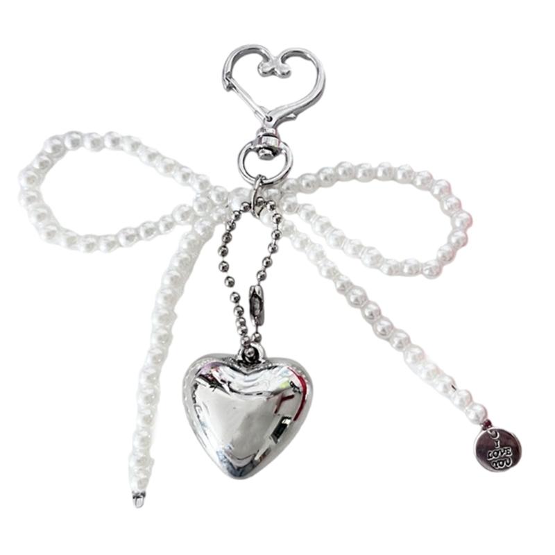 Універсальний модний аксесуар-брелок Модний брелок-підвіска з бантом у формі серця Прості брелоки Аксесуар для сумки-гаманця 1
Універсальний модний аксесуар-брелок Модний брелок-підвіска з бантом у формі серця Прості брелоки Аксесуар для сумки-гаманця 1