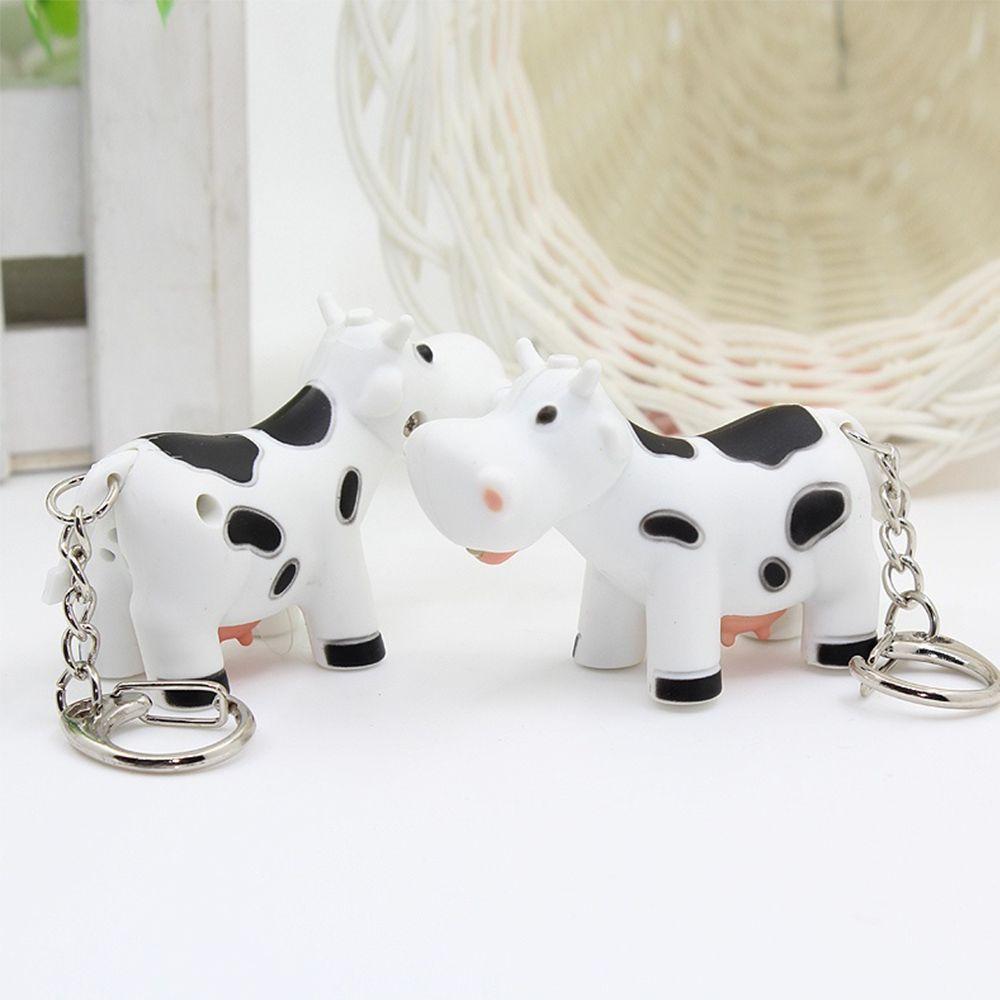 Easy To Carry Small Cow Luminescent Key Rings Key Chain LED Light Vocal чёрный/белый 
Easy To Carry Small Cow Luminescent Key Rings Key Chain LED Light Vocal чёрный/белый