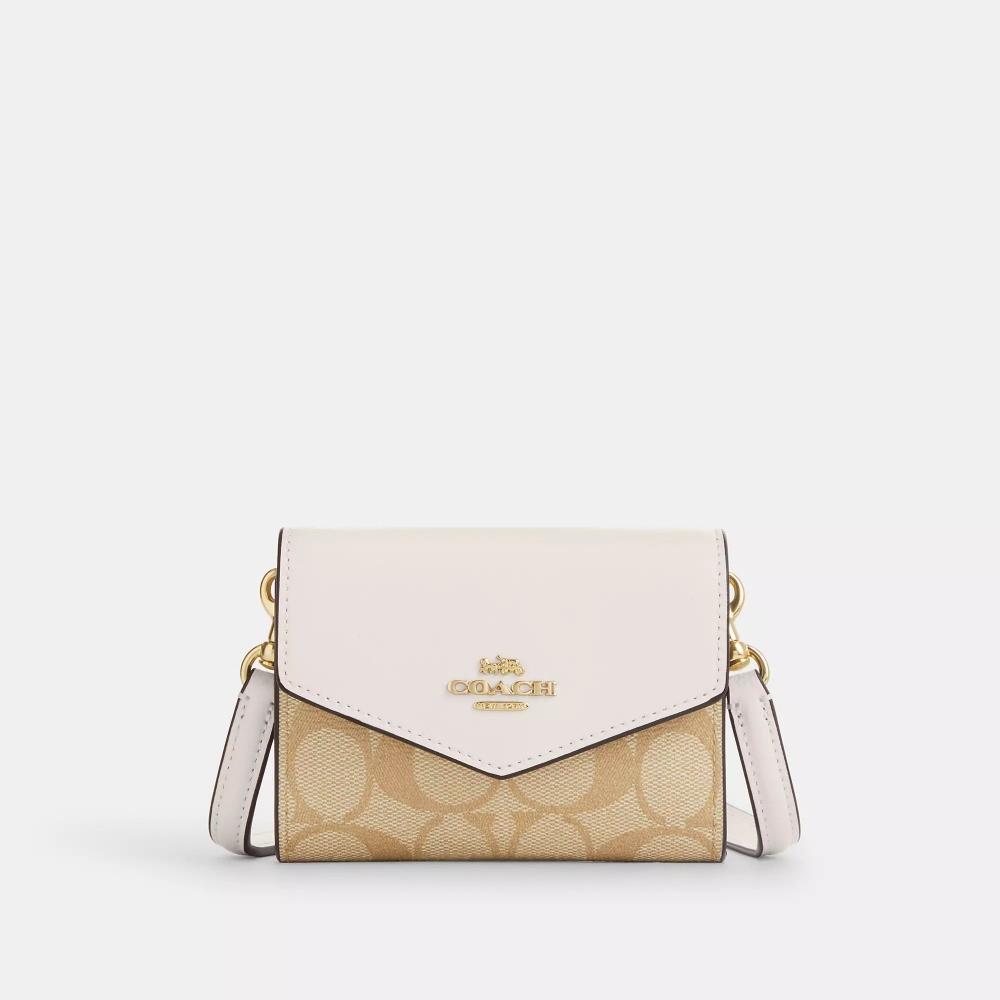 Coach Мини-бумажник-конверт с ремешком из канвы Signature цвета золотистого цвета, светло-хаки, мелом
Coach Мини-бумажник-конверт с ремешком из канвы Signature цвета золотистого цвета, светло-хаки, мелом