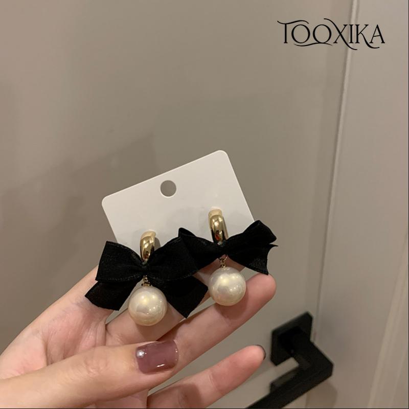 Tooxika Hepburn Style Bow Pearl Earrings Высококачественные роскошные преувеличенные серьги для женщин
Tooxika Hepburn Style Bow Pearl Earrings Высококачественные роскошные преувеличенные серьги для женщин