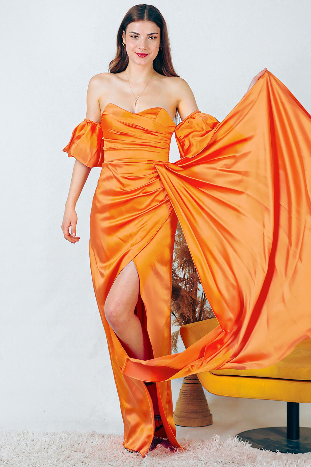 Женское атласное длинное вечернее платье с объемными рукавами 40 оранжевый
Женское атласное длинное вечернее платье с объемными рукавами 40 оранжевый