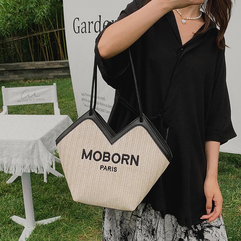 Portable alphabet women s bag 2025 new straw bag women s shoulder bag versatile fashion large-capacity tote bag чорний
Portable alphabet women s bag 2025 new straw bag women s shoulder bag versatile fashion large-capacity tote bag чорний