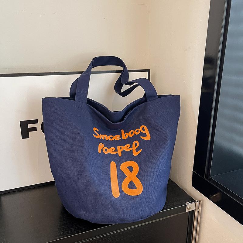 Холщовая сумка большой вместимости, женская новая повседневная универсальная наплечная сумка, нишевый класс, сумка-тоут для поездок на работу темно-синий
Холщовая сумка большой вместимости, женская новая повседневная универсальная наплечная сумка, нишевый класс, сумка-тоут для поездок на работу темно-синий