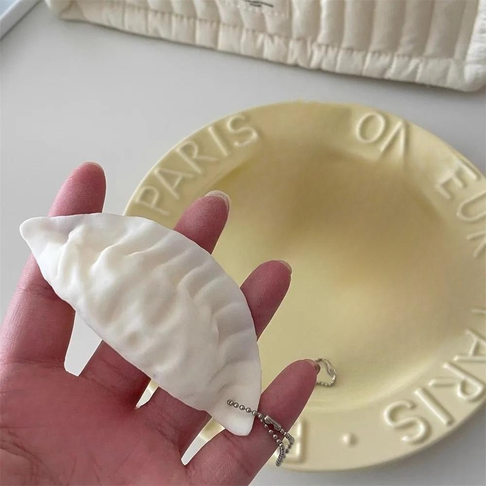 Simulation Dumpling Squishy Stress Relief Toy with Keychain Creative Prank Squeeze Fidget Pendant Anti-Anxiety Decompression Toy
Simulation Dumpling Squishy Stress Relief Toy with Keychain Creative Prank Squeeze Fidget Pendant Anti-Anxiety Decompression Toy