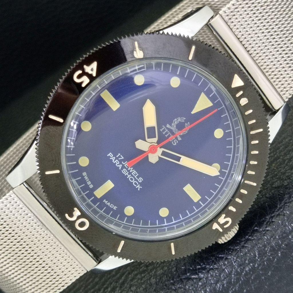 HAND-WINDING VINTAGE TITUS SWISS MENS TURNABLE BEZEL BLUE DIAL WATCH a700032-5 R201-a700032
HAND-WINDING VINTAGE TITUS SWISS MENS TURNABLE BEZEL BLUE DIAL WATCH a700032-5 R201-a700032
