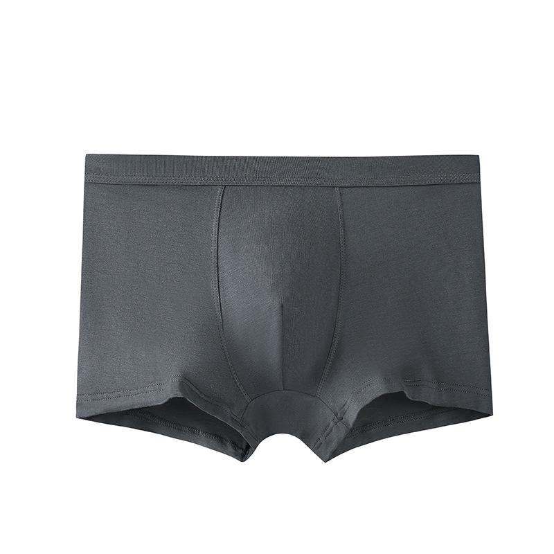 Мужские однотонные модальные трусы-боксеры XXL темно-серого
Мужские однотонные модальные трусы-боксеры XXL темно-серого