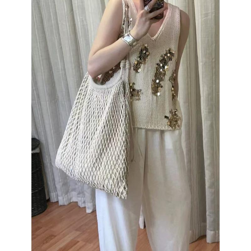 New hollow niche high-end large-capacity hand-woven seaside beach bag shoulder bag tote bag
New hollow niche high-end large-capacity hand-woven seaside beach bag shoulder bag tote bag
