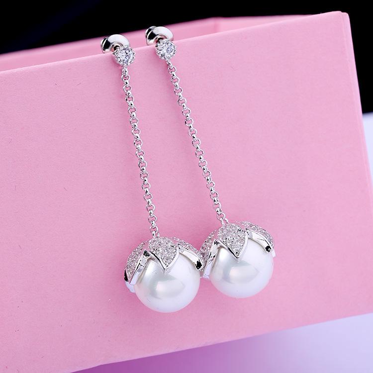 Korean Temperament Pearl Tassel Earrings, S925 Silver Needle, Simple and Versatile. платиновый
Korean Temperament Pearl Tassel Earrings, S925 Silver Needle, Simple and Versatile. платиновый