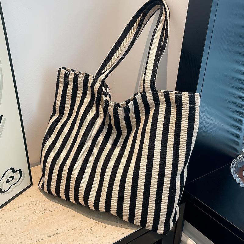 Японская полосатая сумка подмышку большой вместимости для поездок на работу, классная сумка через плечо, модная и универсальная, нишевый дизайн, сумка-тоут
Японская полосатая сумка подмышку большой вместимости для поездок на работу, классная сумка через плечо, модная и универсальная, нишевый дизайн, сумка-тоут